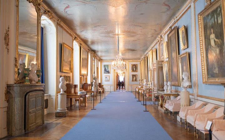 Long gallery with paintings